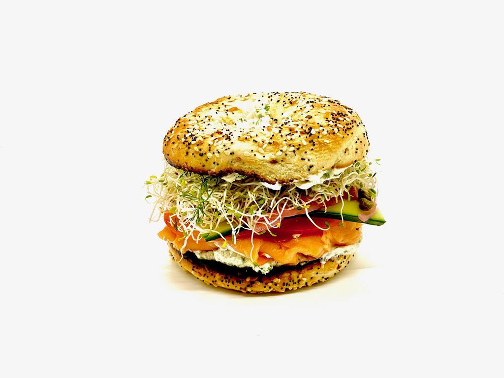 Bagel & Lox Breakfast · Tarragon chive schmear, lox, tomato, cucumber, shaved red onion, sprouts.  Our bagels contain dairy products