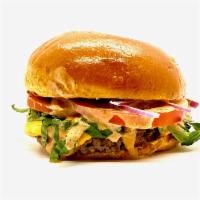 Veggie Burger · Tomato, red onion, shredded lettuce, sharp cheddar, 1000 island, and toasted brioche bun.