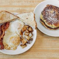 Sunnyside Special Breakfast Plate · 2 eggs any style, choice of meat (bacon, sausage or ham), home fries, choice of toast (white...