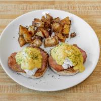Classic Benedict · 2 poached eggs with choice of meat on a English muffin topped with homemade Hollandaise.