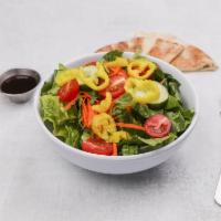 Garden Salad · Romaine lettuce, baby spinachm,carrots, tomatoes, cucumbers and banana peppers. Served with ...
