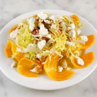 Beet salad · Yellow beets with frisee, walnuts, goat cheese, lemon, Apple cider dressing