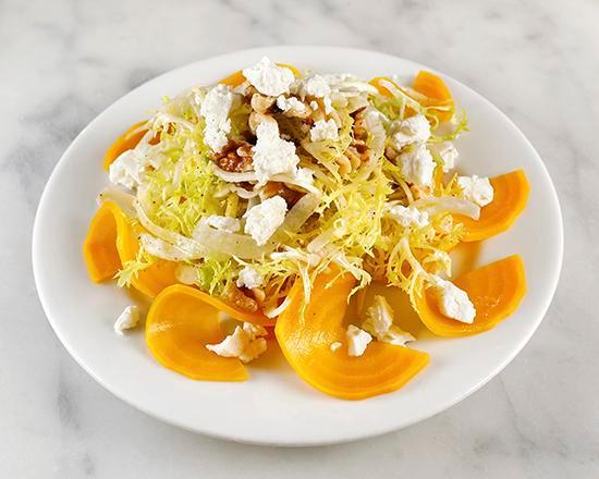 Beet salad · Yellow beets with frisee, walnuts, goat cheese, lemon, Apple cider dressing