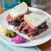 Chef David's Special Pastrami Sandwich · G&D signature house spices served on rye and kirby sour pickled.
