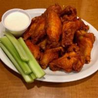 Bone in wings · Bone in breaded wings. Choice of Hot, BBQ or Plain. Served with celery and ranch.