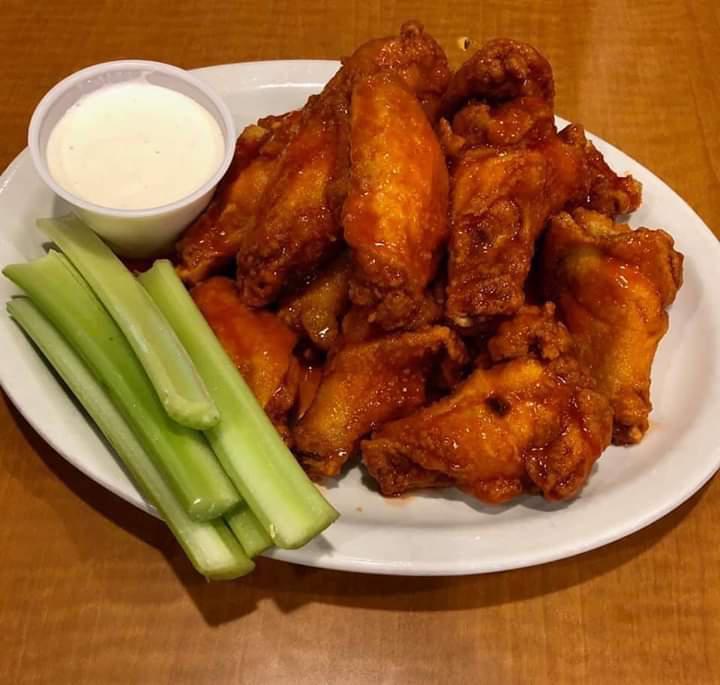 Bone in wings · Bone in breaded wings. Choice of Hot, BBQ or Plain. Served with celery and ranch.