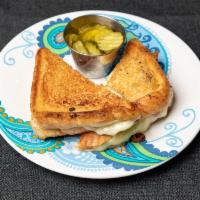 Ultimate Grilled Cheese with Bacon · Hot sandwich filled with cheese that has been pan cooked or grilled. 