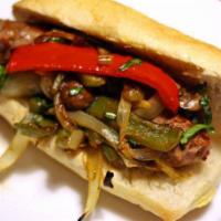 Sausage and Peppers Sub · sausage, peppers and onions tossed in tomato sauce topped with cheese on toasted grinder roll