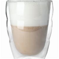 Iced Latte · Cold soy milk, espresso. 12 fluid oz. (355 ml.)