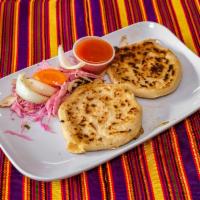 Pupusas · Flat unleavened bread usually topped with cheese, sauce, meats and veggies