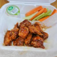 Wings · Served with carrots and celery with blue cheese or ranch dressing.
