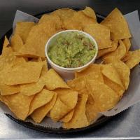 Chips and HOMEMADE Guacamole · Served with our homemade tortilla chips.