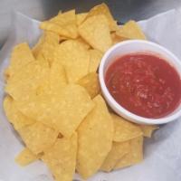 Chips and Salsa · Homemade tortilla chips with choice of our homemade hot salsa or mild chunky salsa. Add home...