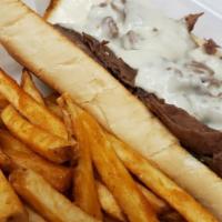 Philly Cheese Steak Sandwich · Covered with grilled onions topped with melted mozzarella cheese. Served on french bread. Ad...