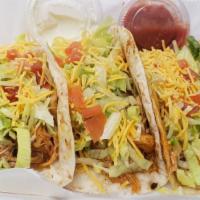 3 Tacos · Hard corn or soft flour shell taco filled with our HOMEMADE ground beef or HOMEMADE chicken ...