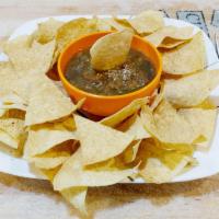 Chips and Salsa · Our secret recipe salsa served with fresh tortilla chips.