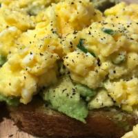 Scrambled Egg Avocado Toast  · An avocado multigrain toast with 3 scranbled eggs
