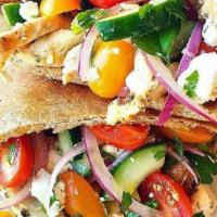 Chicken Greek Salad   · Greek salad pita pockets with chicken. All fresh red onion, tomato, cucumber with feta chees...