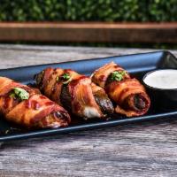 Bacon Wrapped Jalapenos · bacon wrapped jalapenos stuffed with
cream cheese • chipotle strawberry sauce  • served wit...