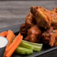 12 Boneless Wings · 12 boneless breaded wings, choice of up to 2 sauces or dry rubs