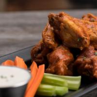 18 Boneless Wings · 18 boneless breaded wings, choice of up to 3 sauces or dry rubs