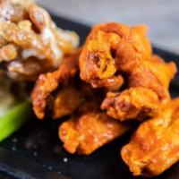6 Traditional Wings · 6 traditional wings, choice of 1 sauce or dry rub