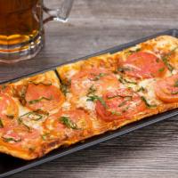Margherita Pizza · mozzarella • parmesan cheese • basil •
tomatoes • EVOO • pizza sauce