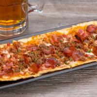Carnivore Pizza · pepperoni • spicy sausage • ham • bacon •
mozzarella • pizza sauce