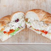Chicken Salad Sandwich · Homemade chicken salad, lettuce, tomato, mayo, salt and pepper, and croissant.