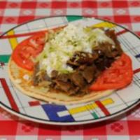 Meat Lover Doner · Gyros. Halal rotisserie lamb sliced and marinated in yogurt and mild spices served on pita b...