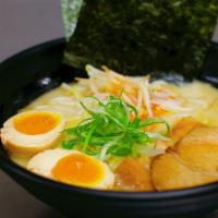 Tonkotsu Classic Ramen · Thick, rich, creamy, 15-hour pork broth, topped with chashu, seasoned egg, bean sprouts, sca...