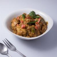 Chicken Tikka Masala · Boneless chicken meat marinated in tandoori sauce. Light fried in fry pan and cooked again i...