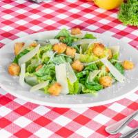 Caesar Salad · Romaine lettuce, Parmesan, homemade croutons and Caesar dressing.