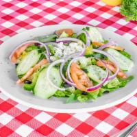 Greek Salad · Romaine lettuce, fresh tomatoes, cucumber, Kalamata olives, feta cheese, red onions, bell pe...