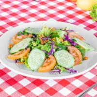 Mixed Green Salad · Mixed greens, fresh tomatoes, shredded carrots, cucumber and ranch.