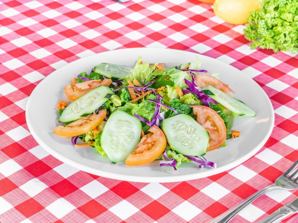 Mixed Green Salad · Mixed greens, fresh tomatoes, shredded carrots, cucumber and ranch.