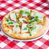 Cable Car Pizza · Creamy garlic sauce, chicken, bacon, fresh tomatoes and green onions.