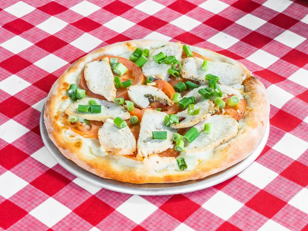 Cable Car Pizza · Creamy garlic sauce, chicken, bacon, fresh tomatoes and green onions.