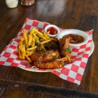 BBQ Pork Ribs · 1 lb. St Louis ribs, tangy BBQ sauce and garlic fries.