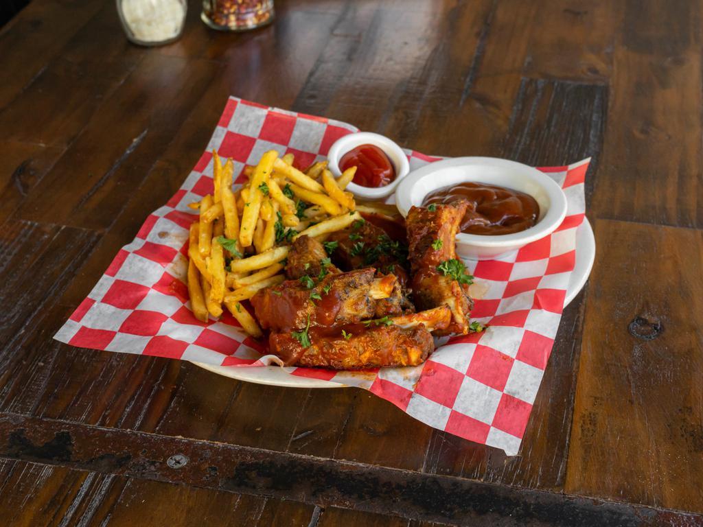BBQ Pork Ribs · 1 lb. St Louis ribs, tangy BBQ sauce and garlic fries.