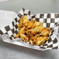 Large Wings  · 10 wings deep fried to crispy perfection.
