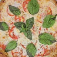 Margherita · Pizza sauce, mozzarella, tomatoes, fresh basil and oregano.