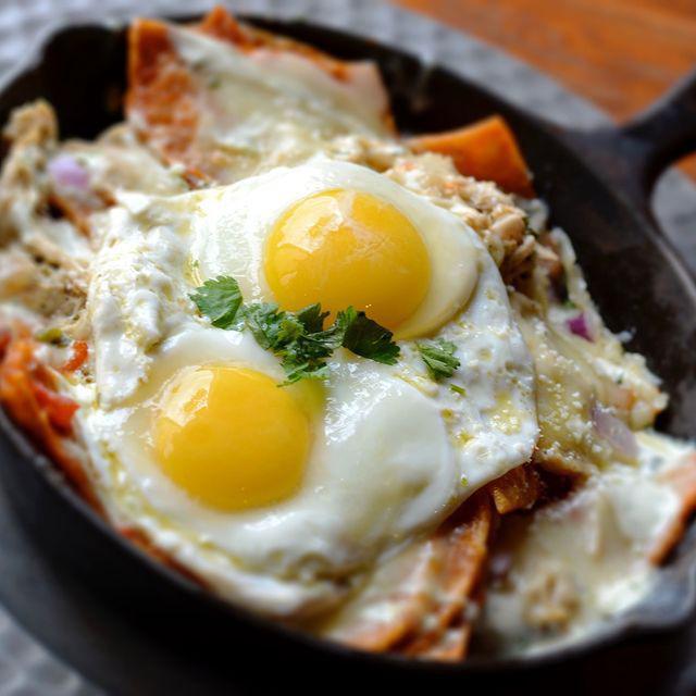 Chilaquiles  · Red or green sauce. Served with 2 eggs and beans.