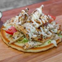 Chicken Pita · A Jimmy's SPECIALTY...LOADED with delicious seasoned chicken breast, sliced and wrapped in a...