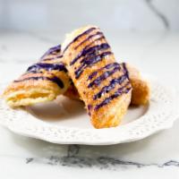 Ube Glazed Cream Cheese Pastry · Ube glazed on flaky pastry with cream cheese filling! 