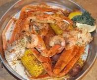 Crab Leg Pot · Comes with red potatoes, corn, and sausage. And topped with our famous homemade garlic butte...