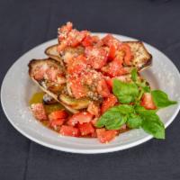 Bruschetta · 4 slices of our housemade bread topped with a delicious mix of fresh diced tomato, fresh gar...