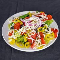 Italian Deluxe Salad · Romaine and iceberg lettuce with red onion, black onion, pepperoni, tomatoes, banana peppers...