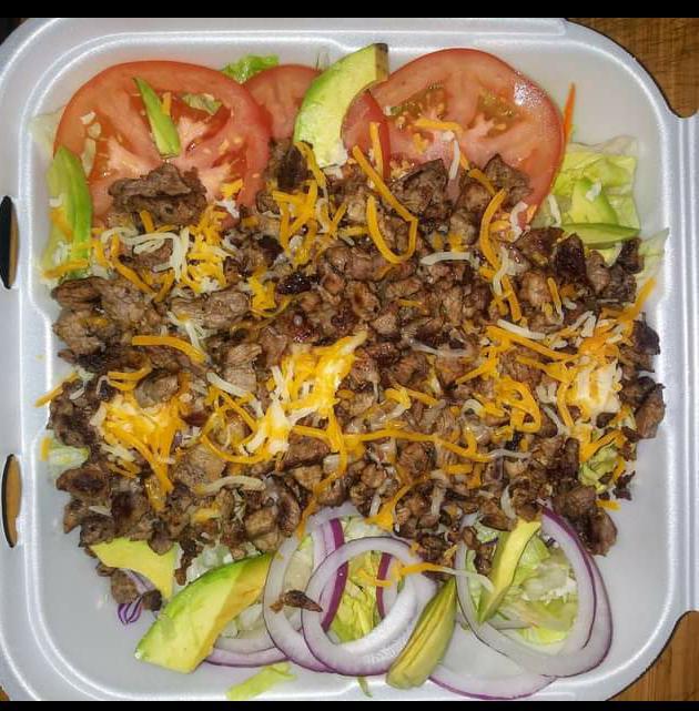 Asada salad · Avocado onions tomato jack and cheddar cheese. Comes with only 2 ranch