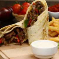 Shawarma (Beef) · Shawarma is well-marinated meat with spice mixture, cooked in its own juices and fat-until p...